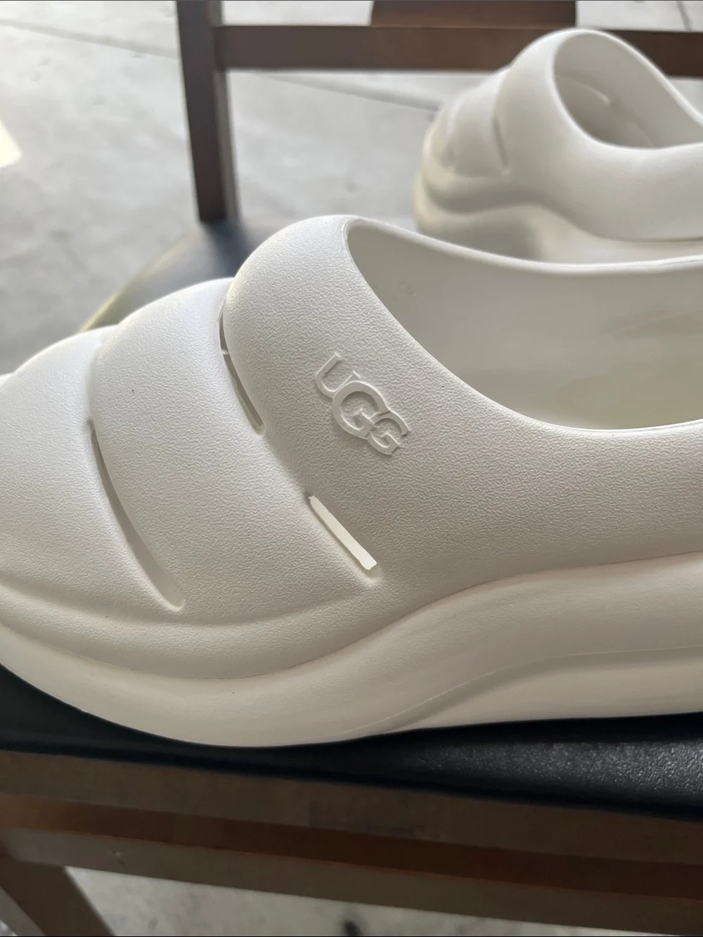 UGG women’s White Slip-On Foam Clog Sneakers
